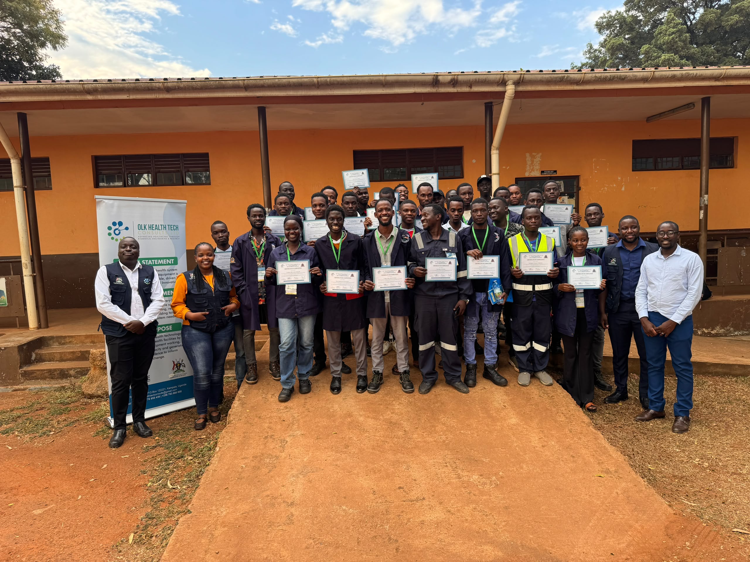 Certificate moment with the Managing Director, KYU Lecturer and Lead Trainer