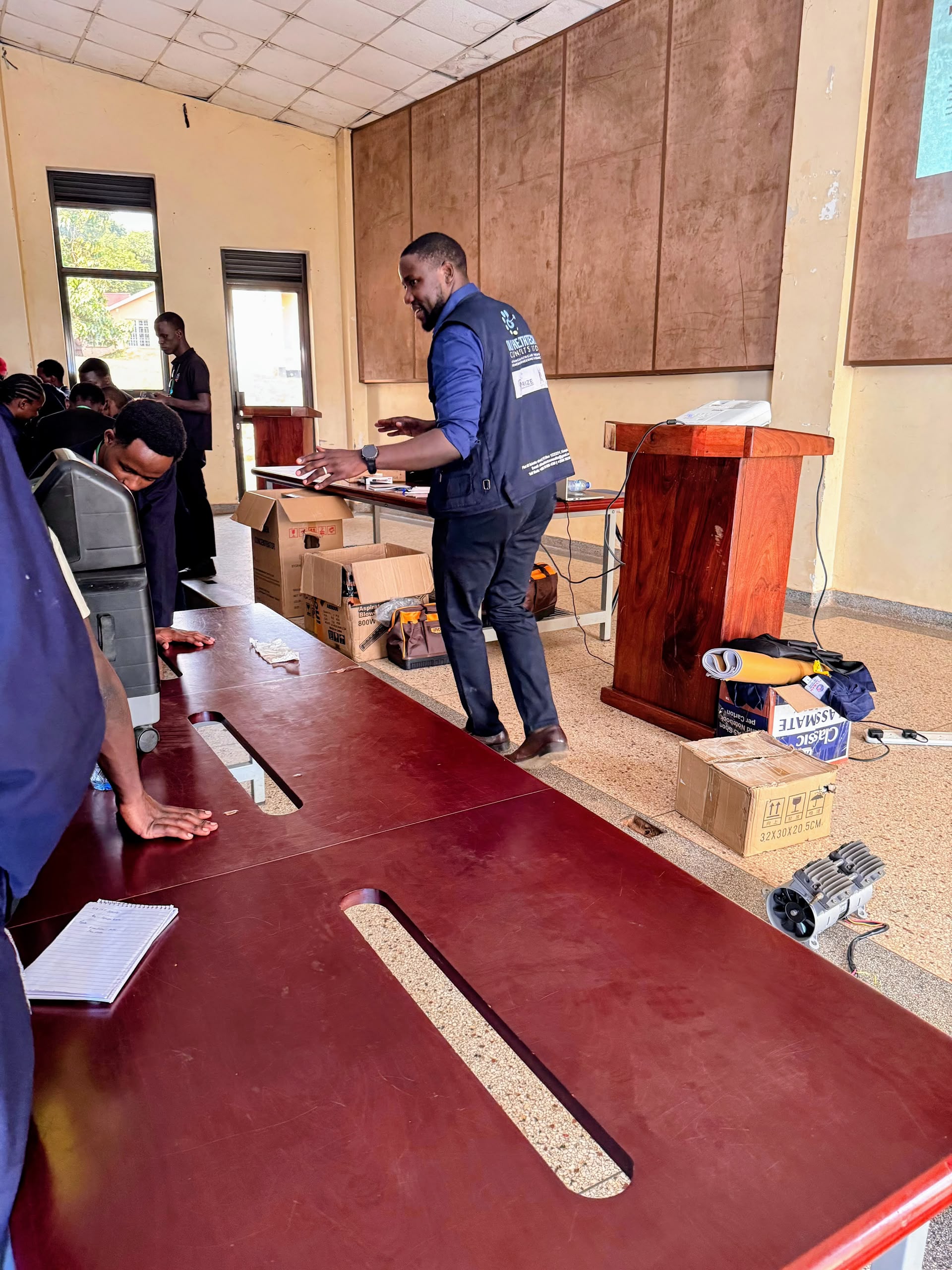 Lead trainer engaging Kyambogo University biomedical engineering students